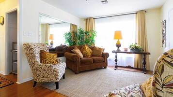 Apartment, Multiple Beds, Balcony, Garden View (Mariposa Monarch) | Living area | 42-inch flat-screen TV with digital channels