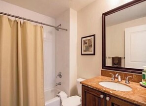 Jetted tub, hair dryer, towels, soap