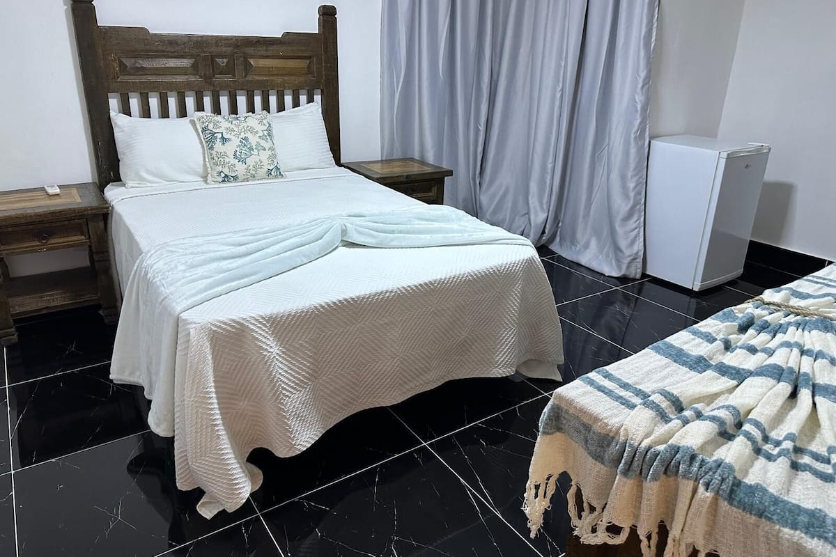 Habitación individual estándar | 1 dormitorio, cortinas opacas, wifi gratis y ropa de cama