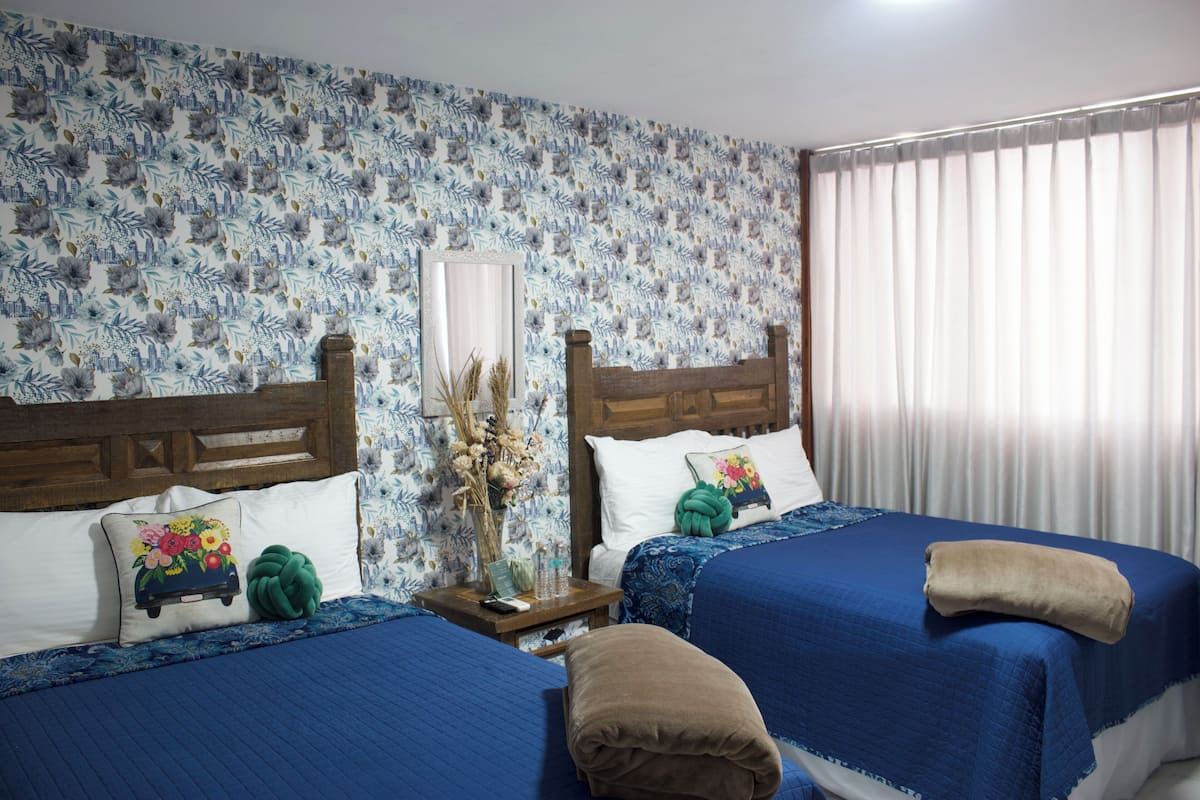 Habitación Deluxe doble | 1 dormitorio, cortinas opacas, wifi gratis y ropa de cama