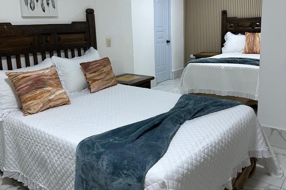 Habitación Deluxe doble | 1 dormitorio, cortinas opacas, wifi gratis y ropa de cama