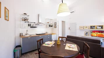 Apartment | Living area | 24-inch flat-screen TV with digital channels