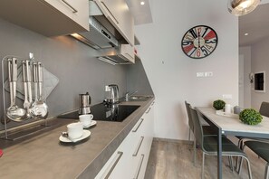 Apartment | Private kitchenette | Full-size fridge, dishwasher, cookware/dishes/utensils - Mamo Florence - Dante & Virgilio Apartments (Florence)