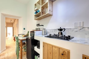 Apartment | Private kitchenette | Full-size fridge, microwave, stovetop, coffee/tea maker - Mamo Florence - Isidora Apartment (Florence)