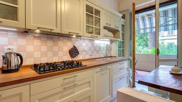 Apartment | Private kitchen | Full-sized fridge, microwave, oven, stovetop