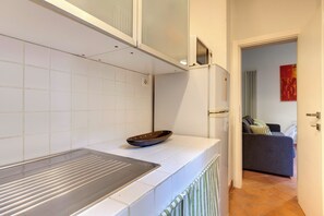 Apartment | Private kitchen | Full-size fridge, microwave, oven, stovetop