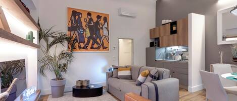 Apartment | Wohnbereich | 40-Zoll-Flachbildfernseher mit Digitalempfang