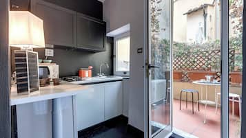 Apartment | Private kitchenette | Full-sized fridge, microwave, stovetop, toaster