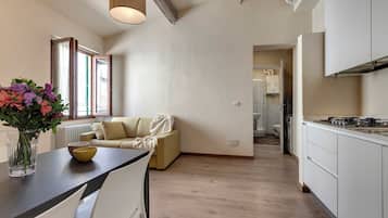 Apartment | Living area | 24-inch flat-screen TV with digital channels