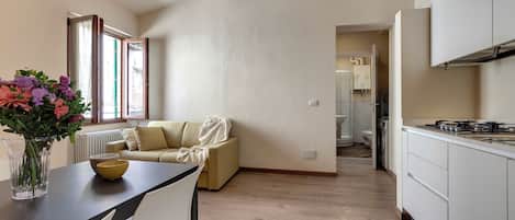 Apartment | Living area | 24-inch flat-screen TV with digital channels