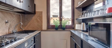 Apartment | Private kitchenette | Full-size fridge, microwave, oven, stovetop