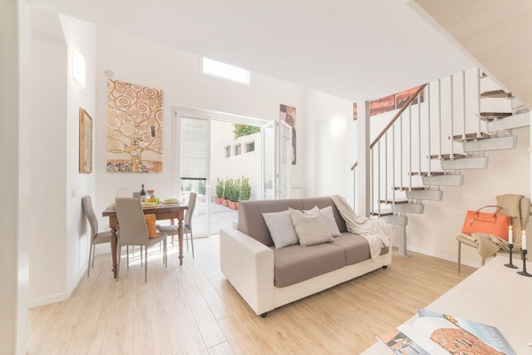 Apartment | Living area | 24-inch flat-screen TV with digital channels