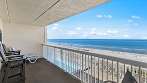 A balcony with a view of the beach and ocean. - Fifty Gulfside Condominiums (Indian Rocks Beach)