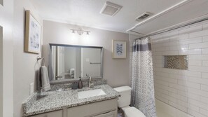 Hair dryer, towels, soap, shampoo