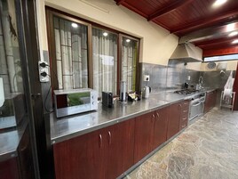 Family Apartment, City View | Shared kitchen | Shared fridge, microwave