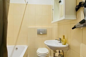 Hair dryer, towels, soap, shampoo