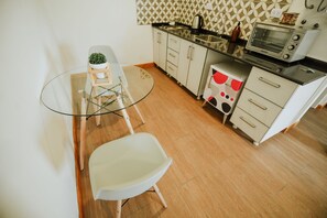 Fridge, coffee/tea maker, cookware/dishes/utensils