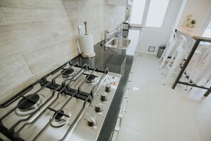 Fridge, microwave, cookware/dishes/utensils