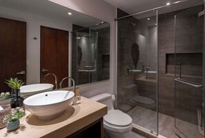 Shower, hair dryer, towels, shampoo