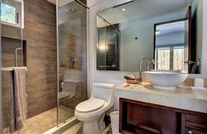 Shower, hair dryer, towels, shampoo