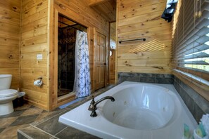 Shower, jetted tub, towels