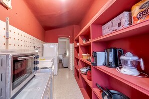 Fridge, stovetop, toaster, cookware/dishes/utensils