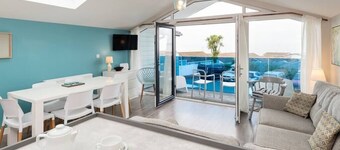 Seaside 3BD Retreat with Balcony and Stunning Views