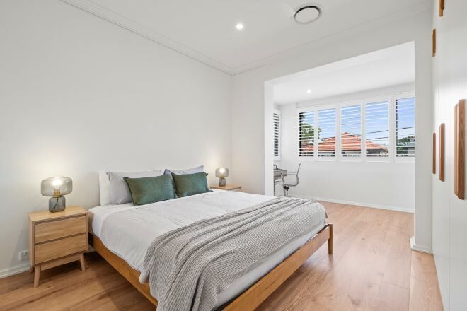 Desk, laptop workspace, blackout drapes, iron/ironing board