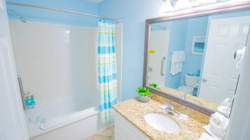 Jetted bath, hair dryer, towels, soap