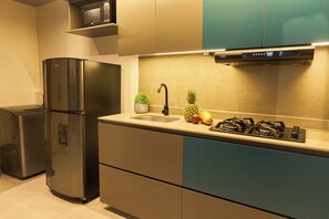 Fridge, microwave, stovetop, coffee/tea maker