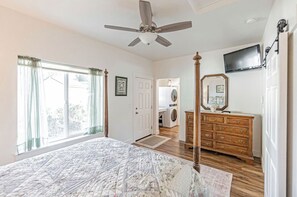 1 bedroom, desk, iron/ironing board, travel crib