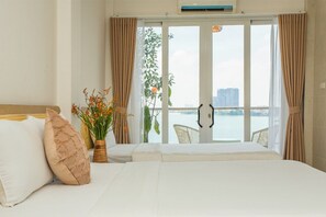Family Apartment, Lake View | Minibar, laptop workspace, free WiFi, bed sheets - 4U Homestay (Hanoi)