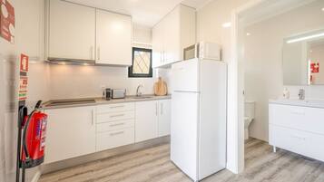 Fridge, microwave, coffee/tea maker, toaster