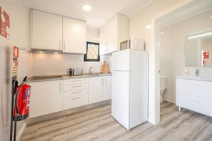 Fridge, microwave, coffee/tea maker, toaster