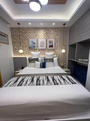 1 slaapkamer, een bureau, een laptopwerkplek, gratis wifi