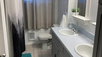 Jetted tub, hair dryer, towels, soap