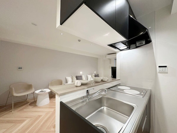 Fridge, microwave, stovetop, cookware/dishes/utensils - Central Hiroshima Studio Stay with Free Breakfast (Naka Ward, Hiroshima)