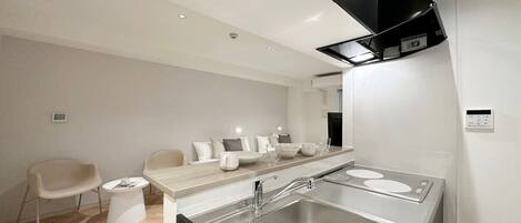 Fridge, microwave, stovetop, cookware/dishes/utensils