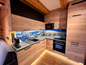 Microwave, oven, dishwasher, dining tables