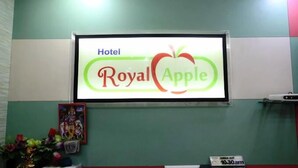 A sign for 'Royal Apple Hotel' with a check-out time of 10:30 AM. - Hotel Royal Apple (Ahmedabad)