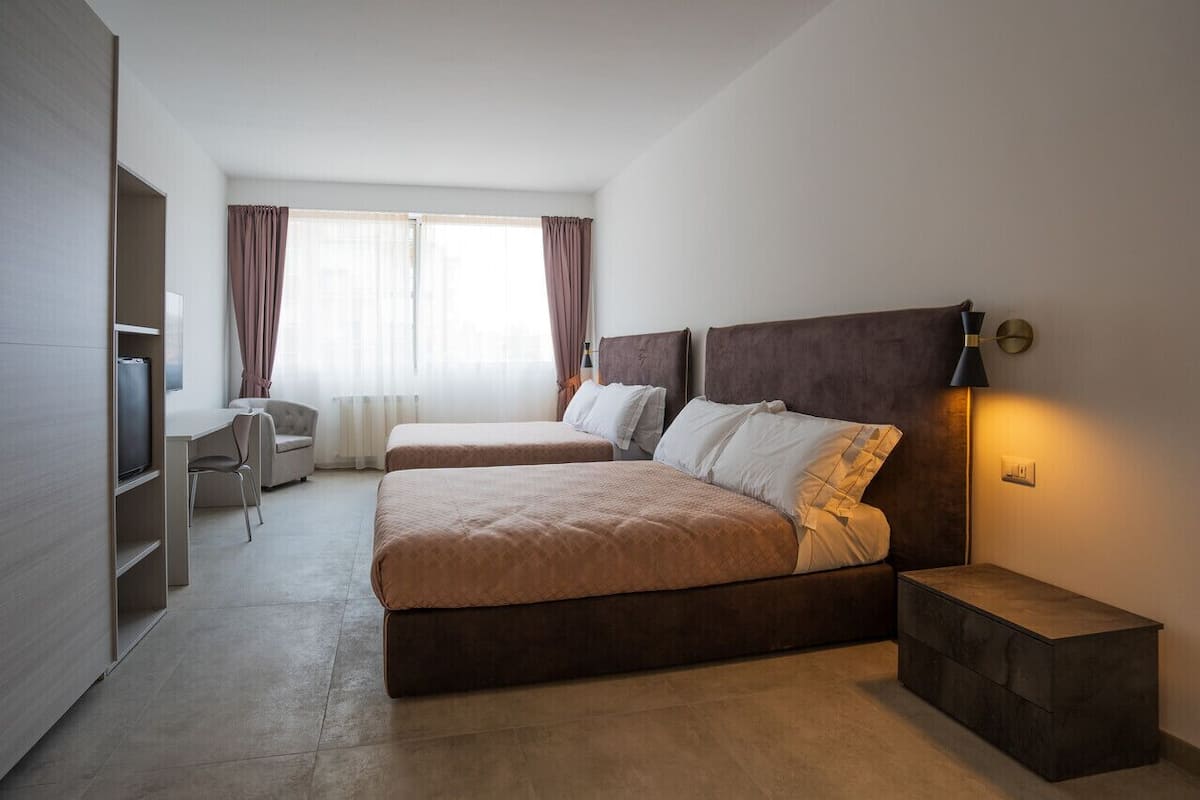 Comfort Quadruple Room | 1 bedroom, in-room safe, desk, blackout curtains