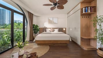 Family Room, 2 Bedrooms, Garden View | Premium bedding, minibar, individually decorated, individually furnished