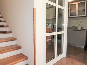 Oven, dishwasher, toaster, dining tables