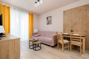 Appartement, 1 chambre, balcon | Salle de séjour