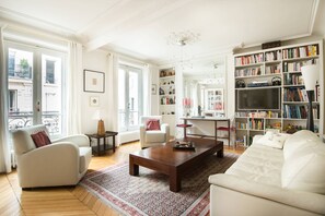 Smart TV, books - Savor French Flair on Boulevard St. Germain-crisp ,formal luxury (Paris)