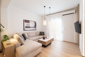 Luxury Apartment, 3 Bedrooms, Kitchen, City View | Living area | 120-inch TV with cable channels