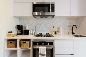 Microwave, stovetop, coffee/tea maker, toaster
