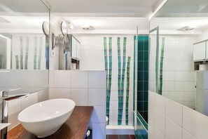 Shower, towels, toilet paper