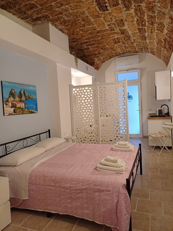 Lyxstudio - utsikt mot innergÄrden | Egyptiska bomullslakan och sÀngtillbehör av högsta kvalitet