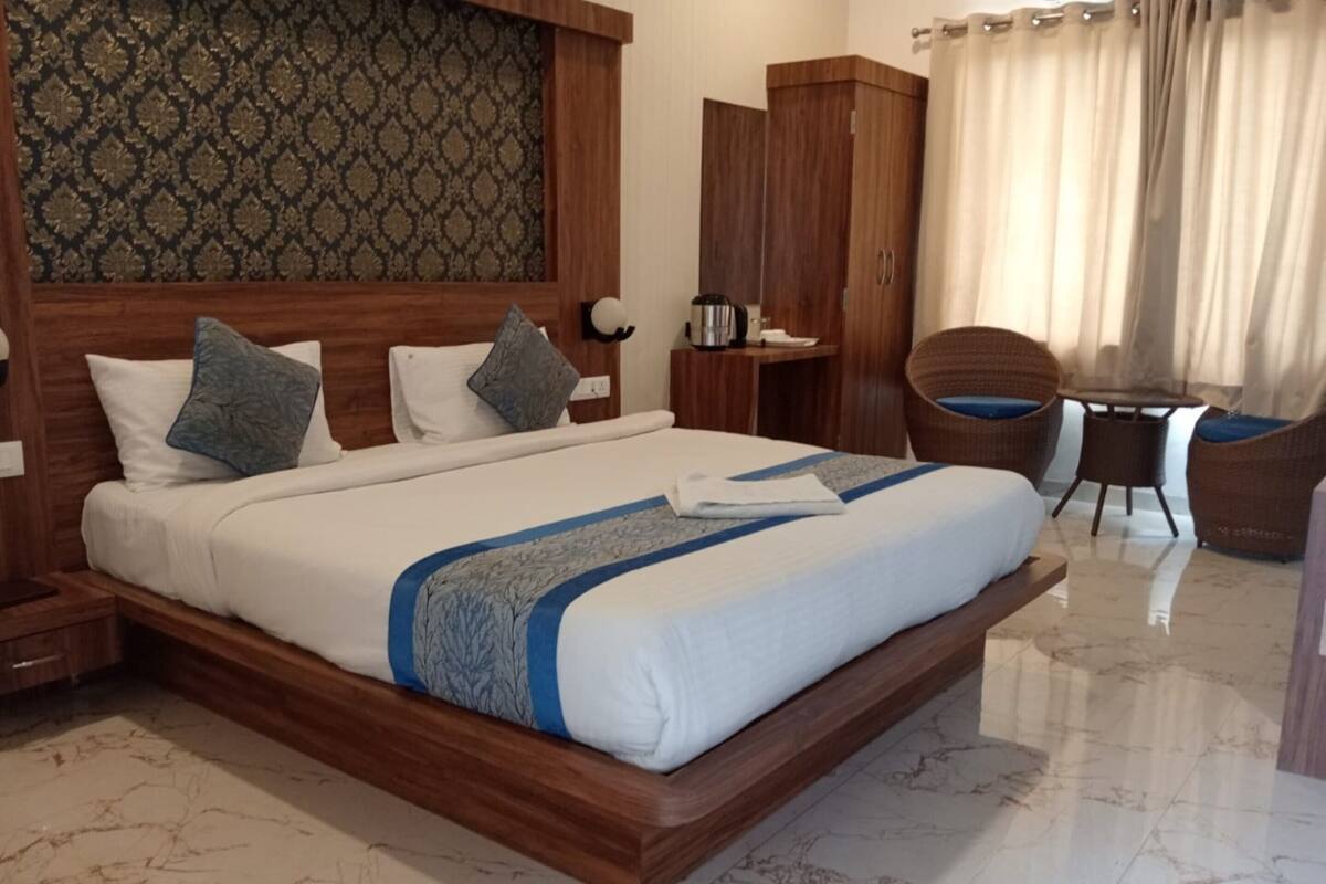 Quarto casal luxo, vista para a cidade | Wi-Fi de cortesia, roupa de cama